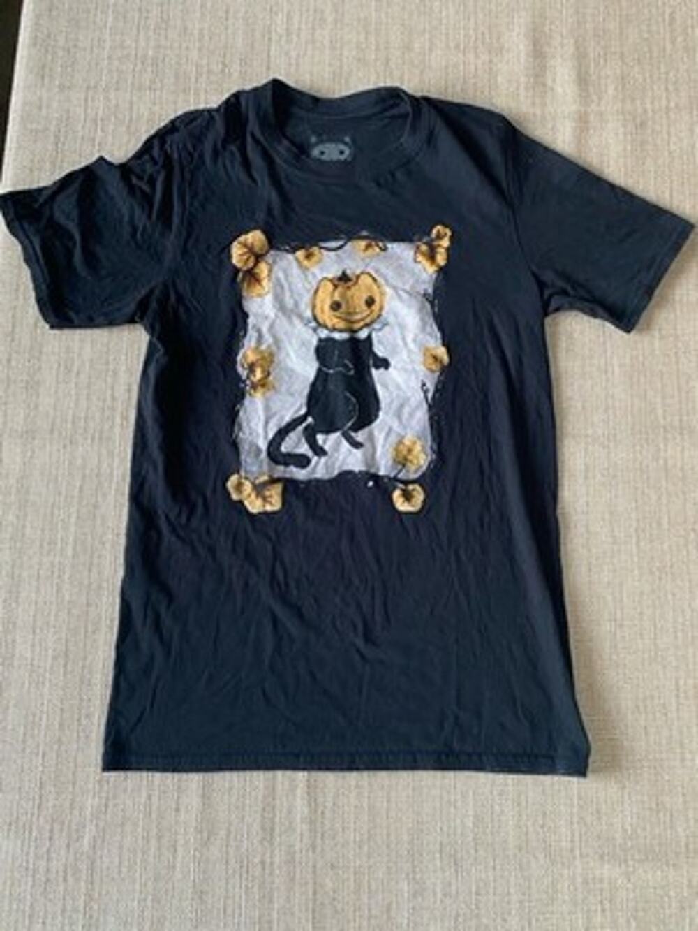 Stephanie Bayles "Guild of Calamity Black Pumpkin Head Cat Graphic T-Shirt S